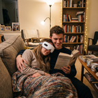 Couple relaxing on the sofa with Lidly Classic