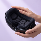 Hands holding the Lidly eye massager